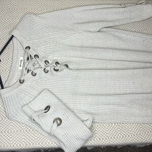 cream sweater with ties